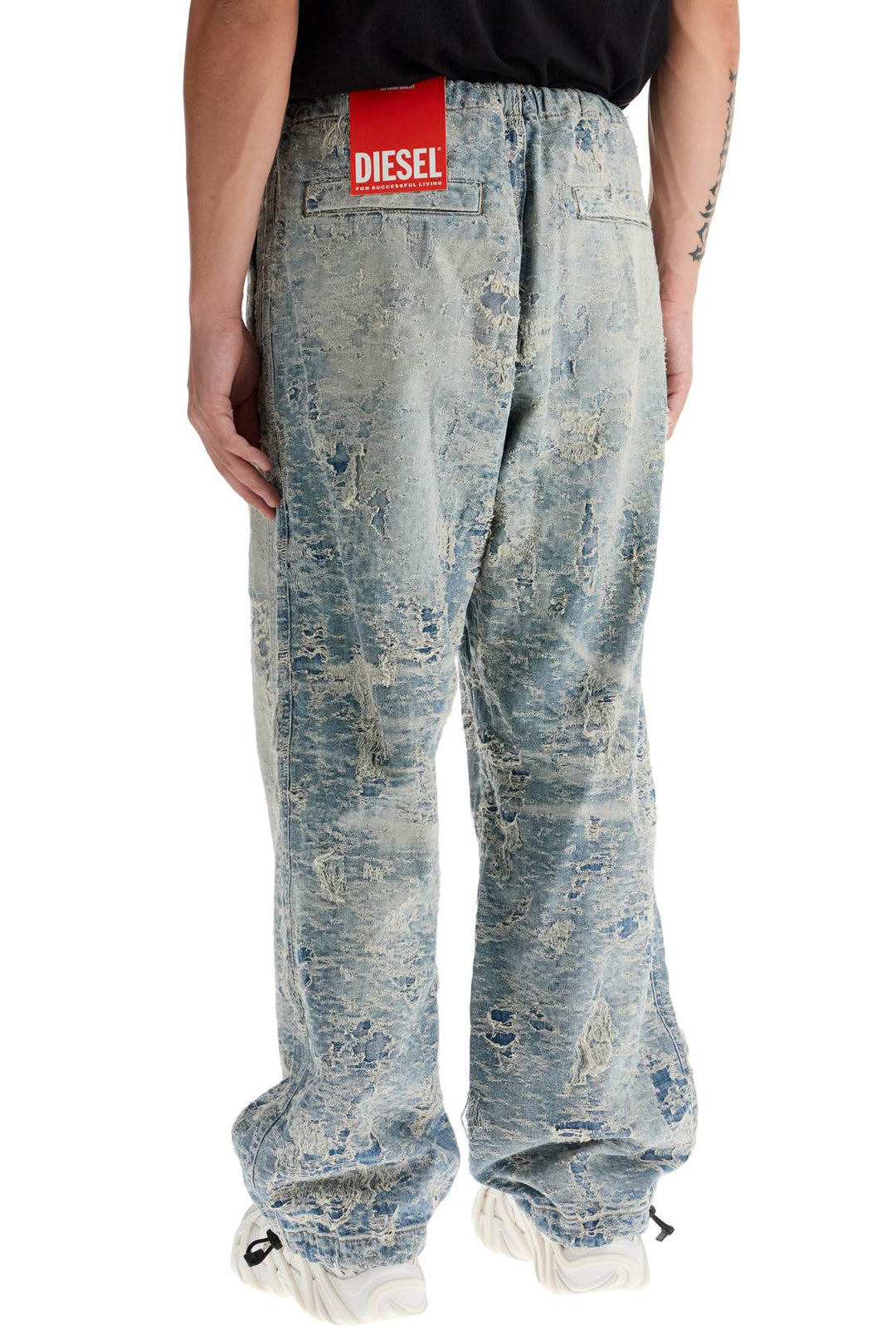 Pantaloni In Denim Jacquard Distressed