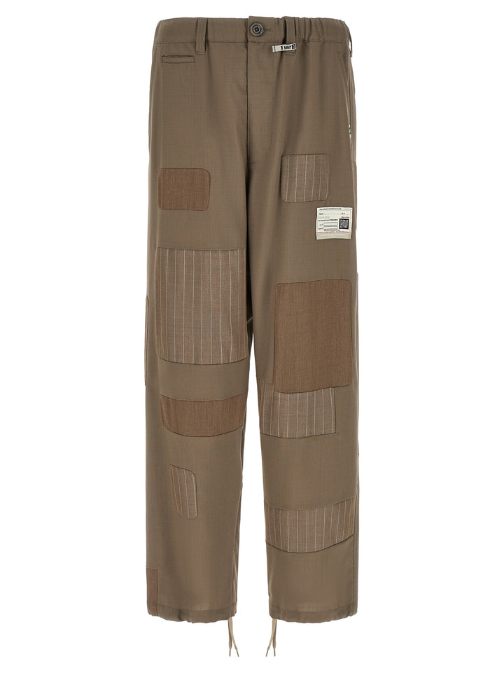 Maison Mihara Yasuhiro Repaired Wool Pants - Beige | d4767bf6a0635df5d9ee56b3eaa95e0632facc43