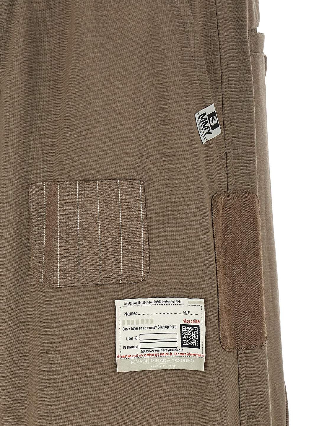 Maison Mihara Yasuhiro Repaired Wool Pants - Beige | d2a130bcfc2a982d4ad9a5b273a7e3f63dcffbea
