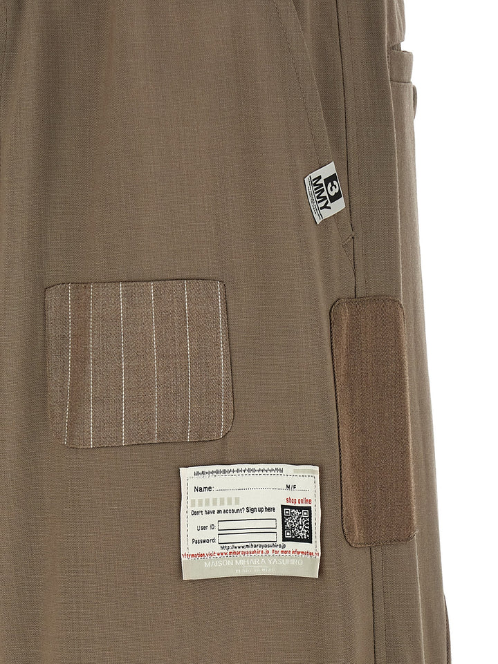 Maison Mihara Yasuhiro Repaired Wool Pants - Beige | d2a130bcfc2a982d4ad9a5b273a7e3f63dcffbea