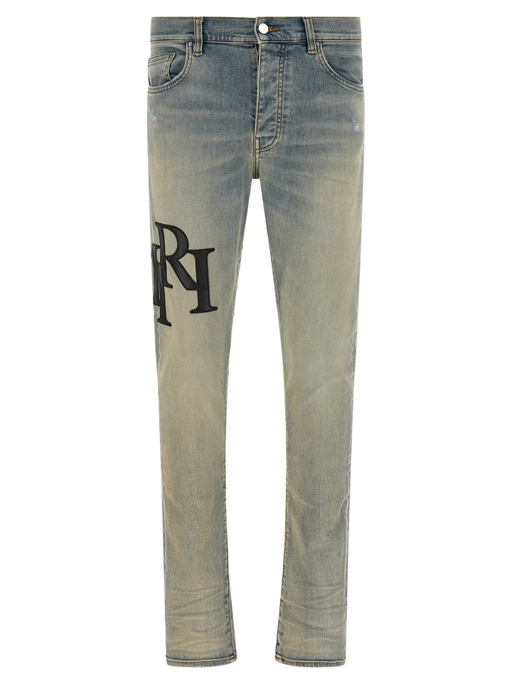 Amiri Staggered Logo Jeans - Light Blue | d035d99dc599bf56f9eabc201ee4d01d8cfaae8d