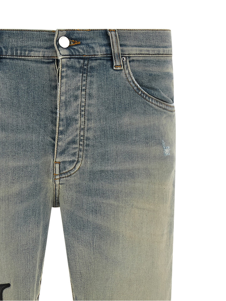 Amiri Staggered Logo Jeans - Light Blue | 194fe0154265571a3e060ee2811027e28eb63854