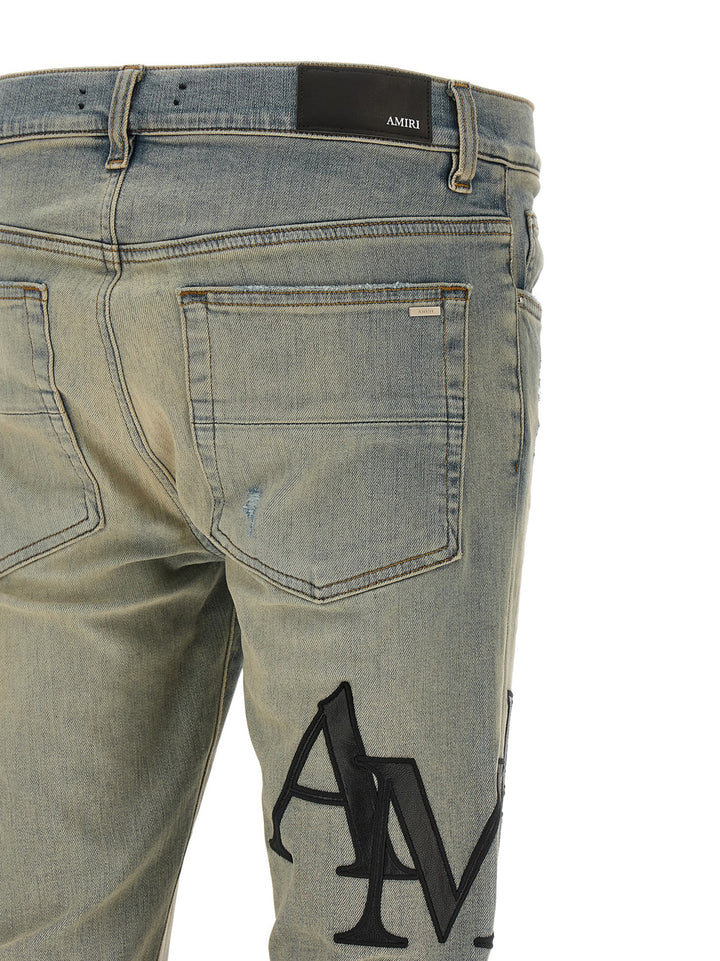 Amiri Staggered Logo Jeans - Light Blue | c55997b78139b5586824df629a6578a48e145434