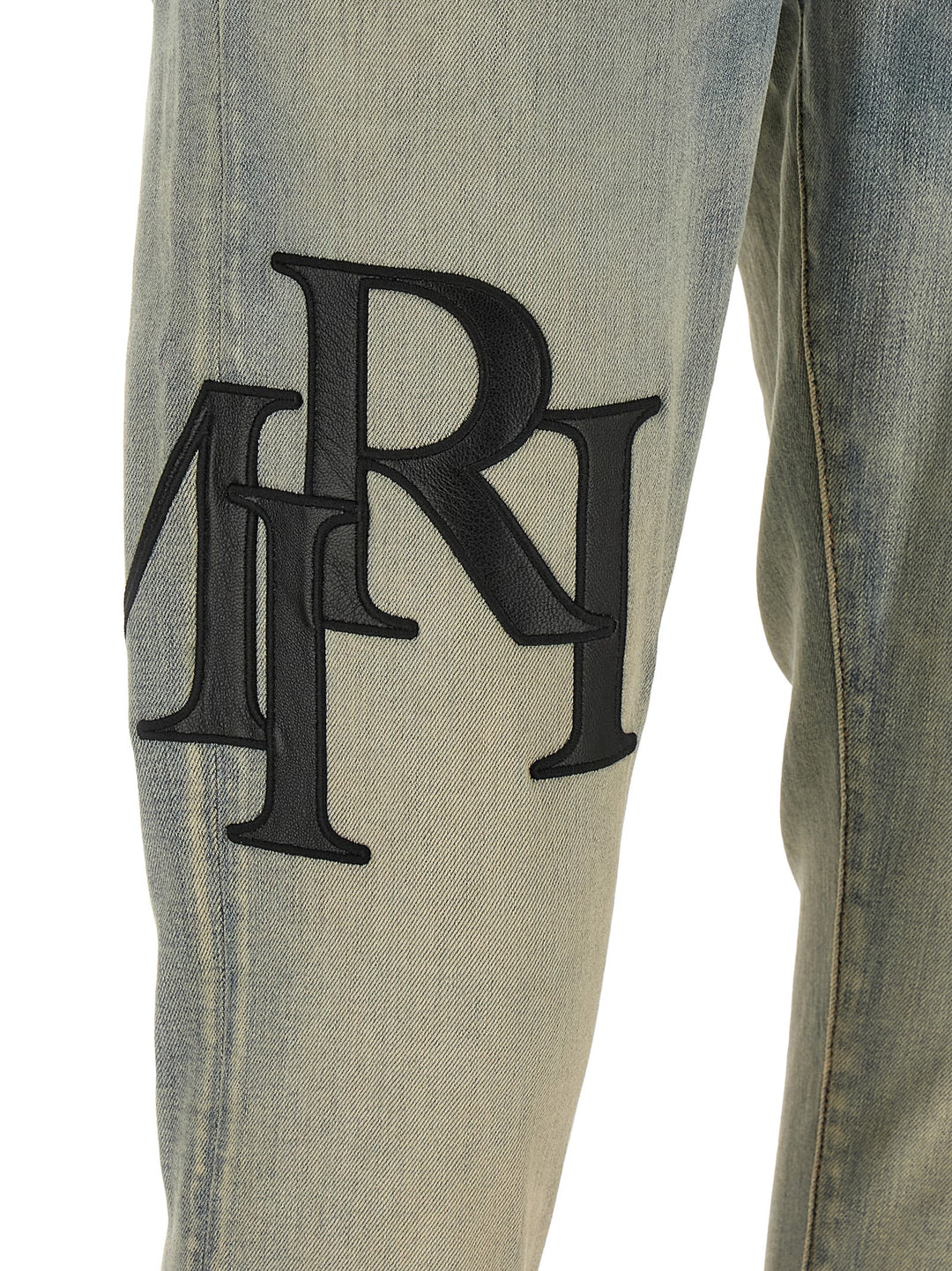 Amiri Staggered Logo Jeans - Light Blue | 51bfd4c6004d7b95f2424b5c34e27773e207af2c