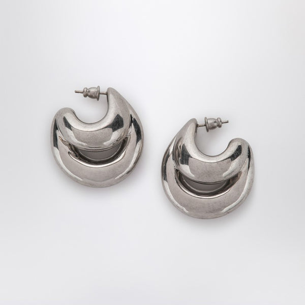 Blow Up Huggies Earrings In Silver Tone