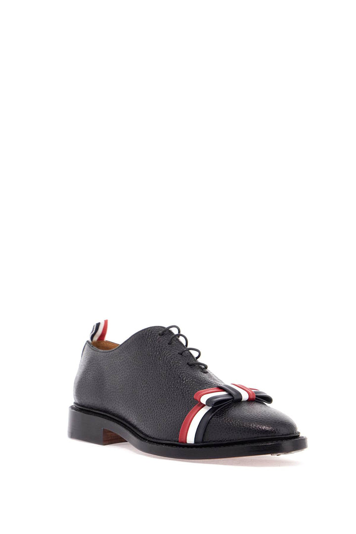 Elegant Wholecut Shoes In Black Calfskin With Rwb Bow