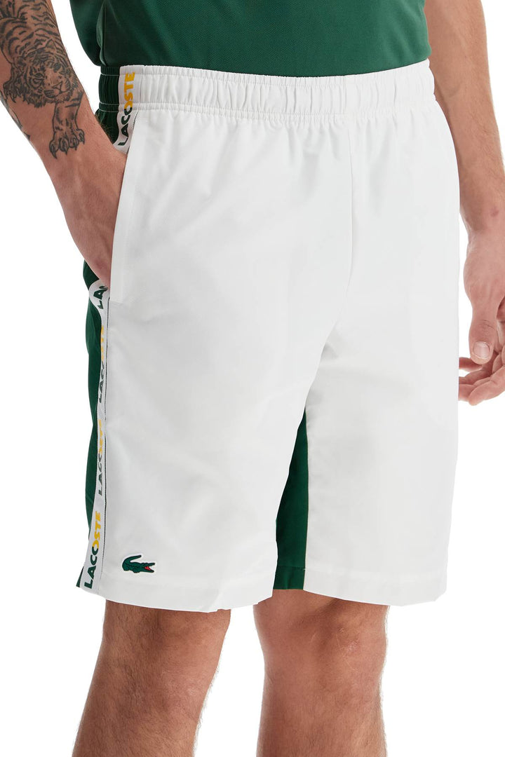 With Logo On The Bermuda Shorts