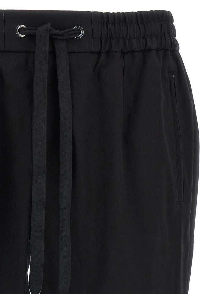 Dolce & Gabbana Logo Plaque Pants - Black | 1bf340f024a063b57814ddc17f2cae80f3f3be76