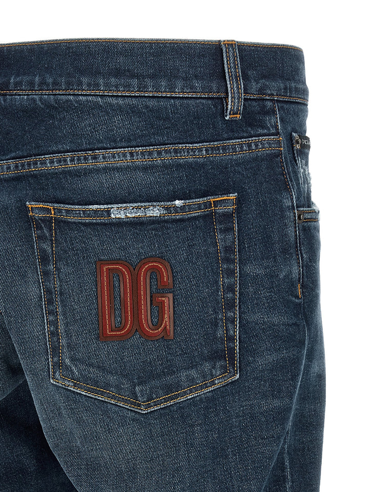 Dolce & Gabbana Logo Patch Jeans - Blue | ce0bc41fcdc7211e3797bbd57b889ea2939efb75