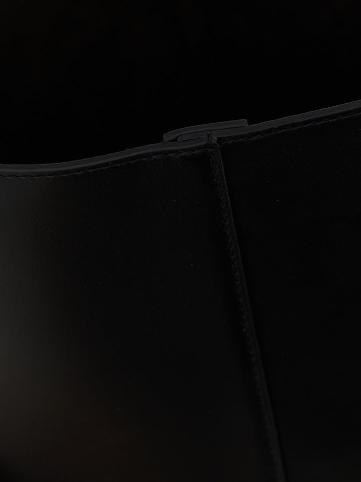 J.W. Anderson The Jwa Small Corner Bucket Shoulder Bags - Black | a235512a9245f56c65d64aea7a1f05ee7467c9fe