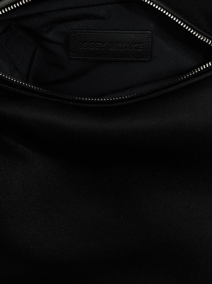 Issey Miyake Enveloping Square Shoulder Bags - Black | 76b99466db3a2fc8b668fee231f594a356204567