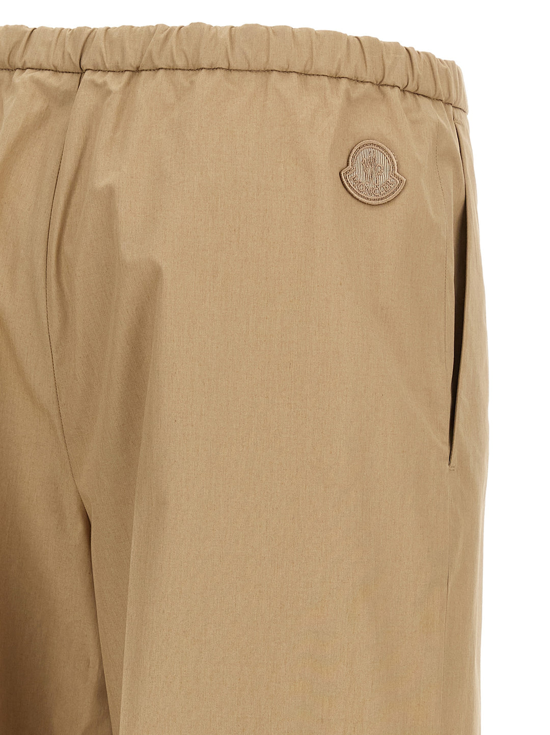 Moncler Grosgrain Logo Patch Pants - Beige | d4ce5a5d1142208ec138db75a91214a0e28188db