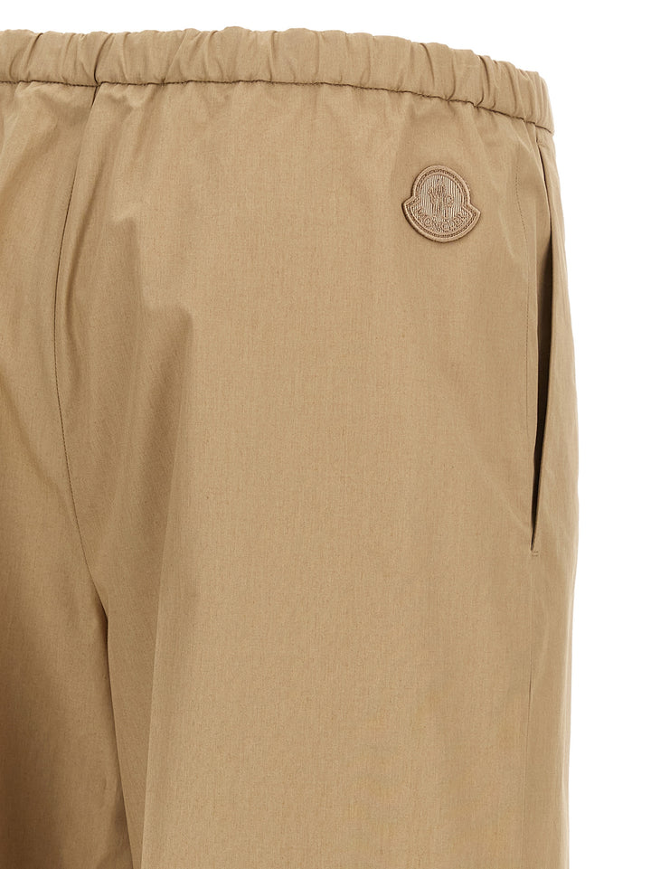 Moncler Grosgrain Logo Patch Pants - Beige | d4ce5a5d1142208ec138db75a91214a0e28188db
