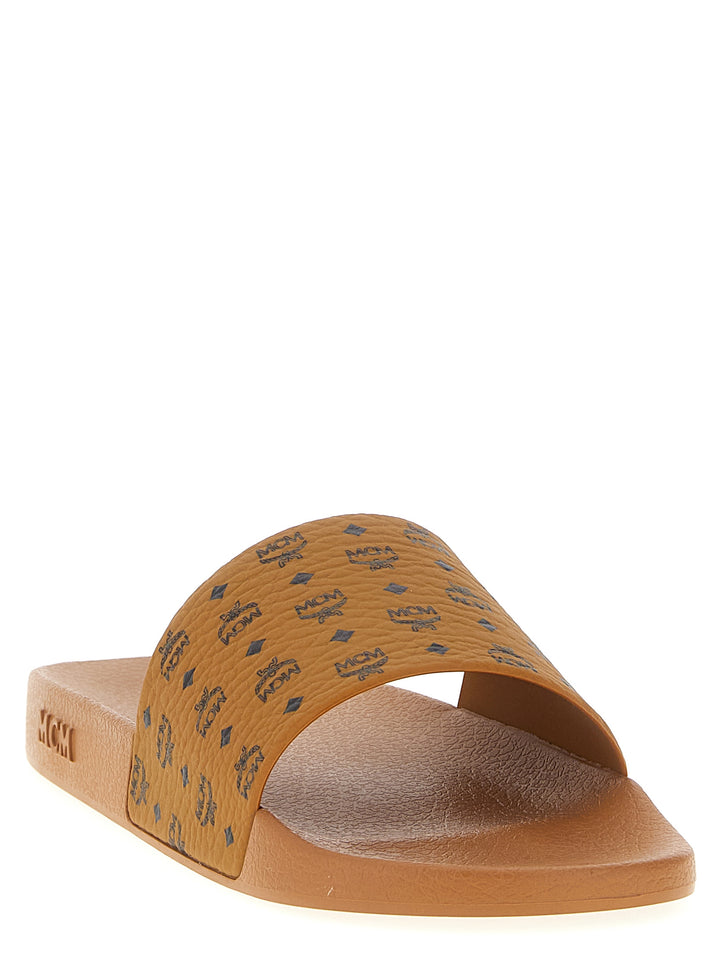 Mcm All-Over Monogram Slides Sandals - Brown | 6707ae323eb81938654709bffa9791a21fcfe575