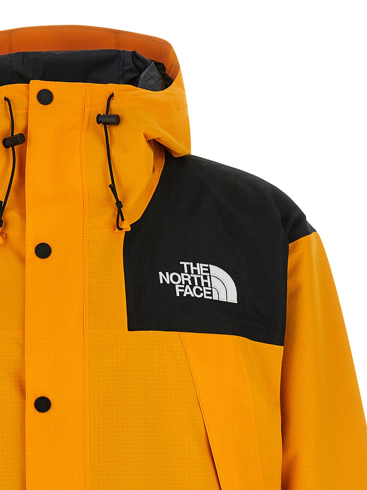 The North Face Mountain Mono Puffer Jackets - Yellow | 4c5581cb686e4a86b0d57c09af5da0550c4cd45c
