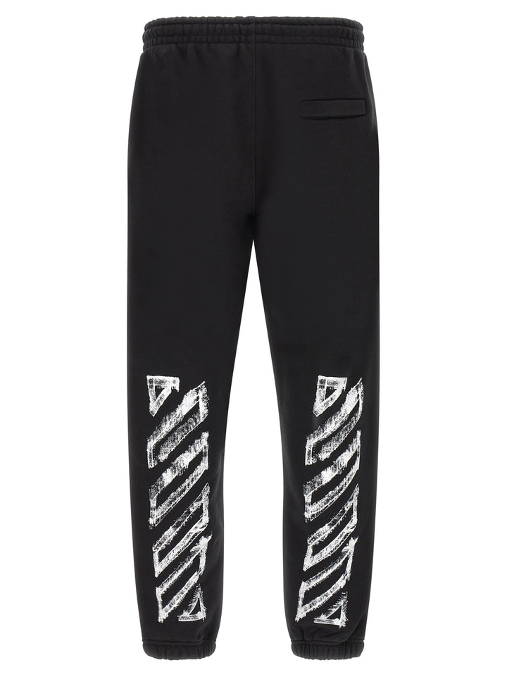Off-White Motion Arrow Cuffed Pants - Black | 946c6c0ba08e6c08632d9f2321f6782b29f29a26
