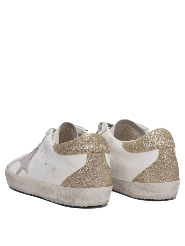 Golden Goose Super-Star Sneakers & Slip-On - White | a956bc6bb7351ad3de9e02153e93e1ae57e7dc2d