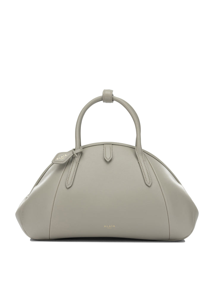 AlaïA Purse Top Handle Handbags - Beige | 77cb53c05e42ec9dde50120dab5235e14c81d728