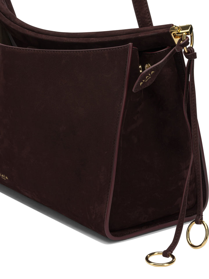 AlaïA Le Click Pocket 35 Shoulder Bags - Bordeaux | e28f747ea43f8eaf5936c4cdc2bb23a1ae568f56