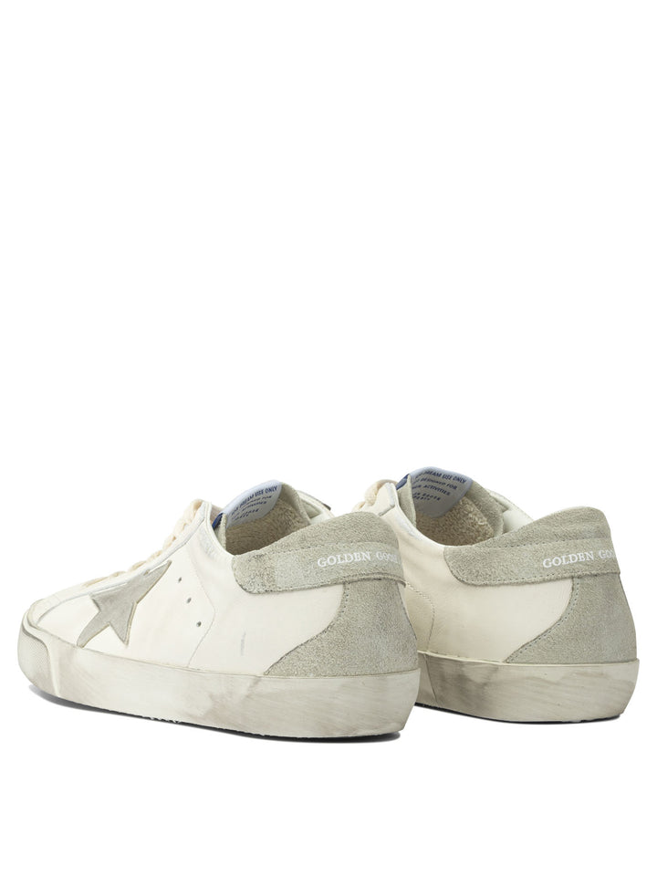 Golden Goose Super-Star Sneakers & Slip-On - White | ca070415cddb7afb121abfd9ee3b3264cb634d36