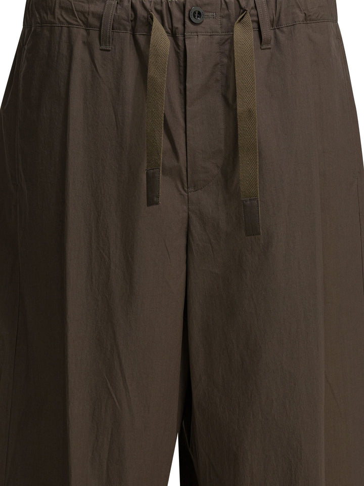 Sacai Typewriter Trousers - Brown | e172c5b4eff615bfc4ecb3520458df3c525c2e89