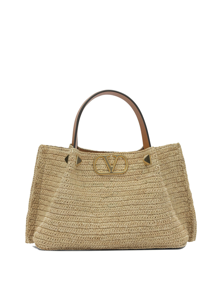 Valentino Garavani Vlogo Raffia Medium Handbag Handbags - Beige | e6c212ce34f561df787006a7ea07f53acc7705c7
