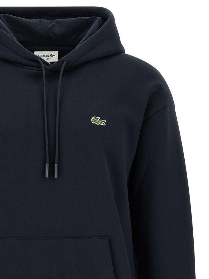 Lacoste Logo Patch Hoodie Sweatshirt - Blue | f83d7fbae5be8adc1045f1f9fb9ca131cc2f4f1b