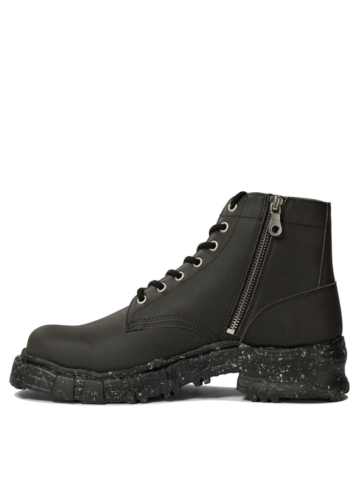 Maison Mihara Yasuhiro Vintage-Like Combat Boots - Black | 8bdd3b7e5baa3d53388ca5759c97e3aa171fae3d