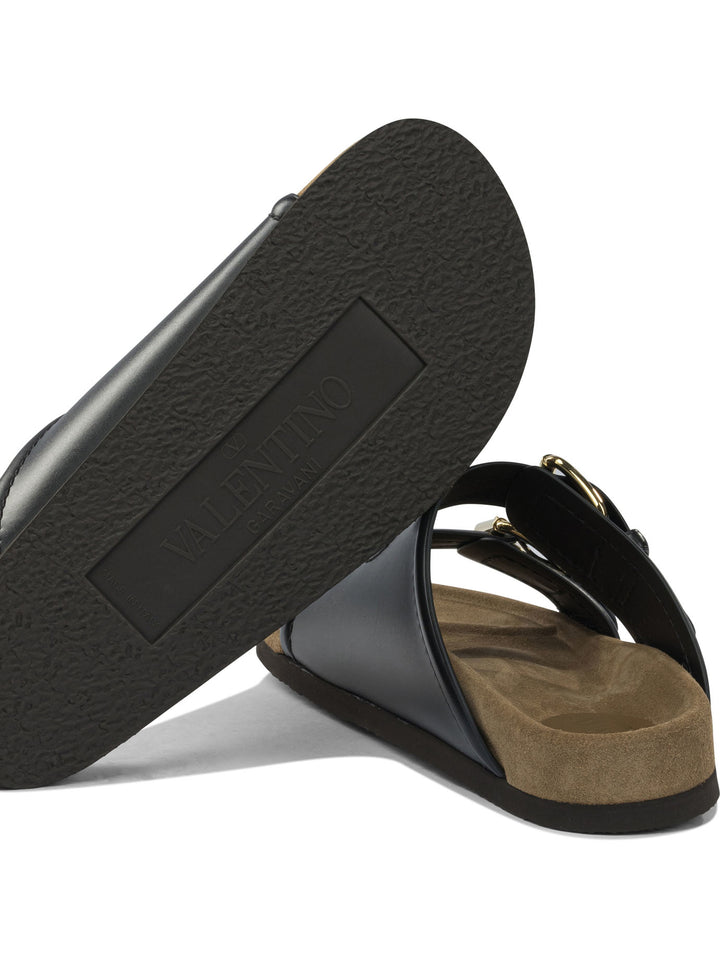 Valentino Garavani Fussfriend Sandals - Black | adae77d9fa1d76b723fd80e79b39bd6d71370f47