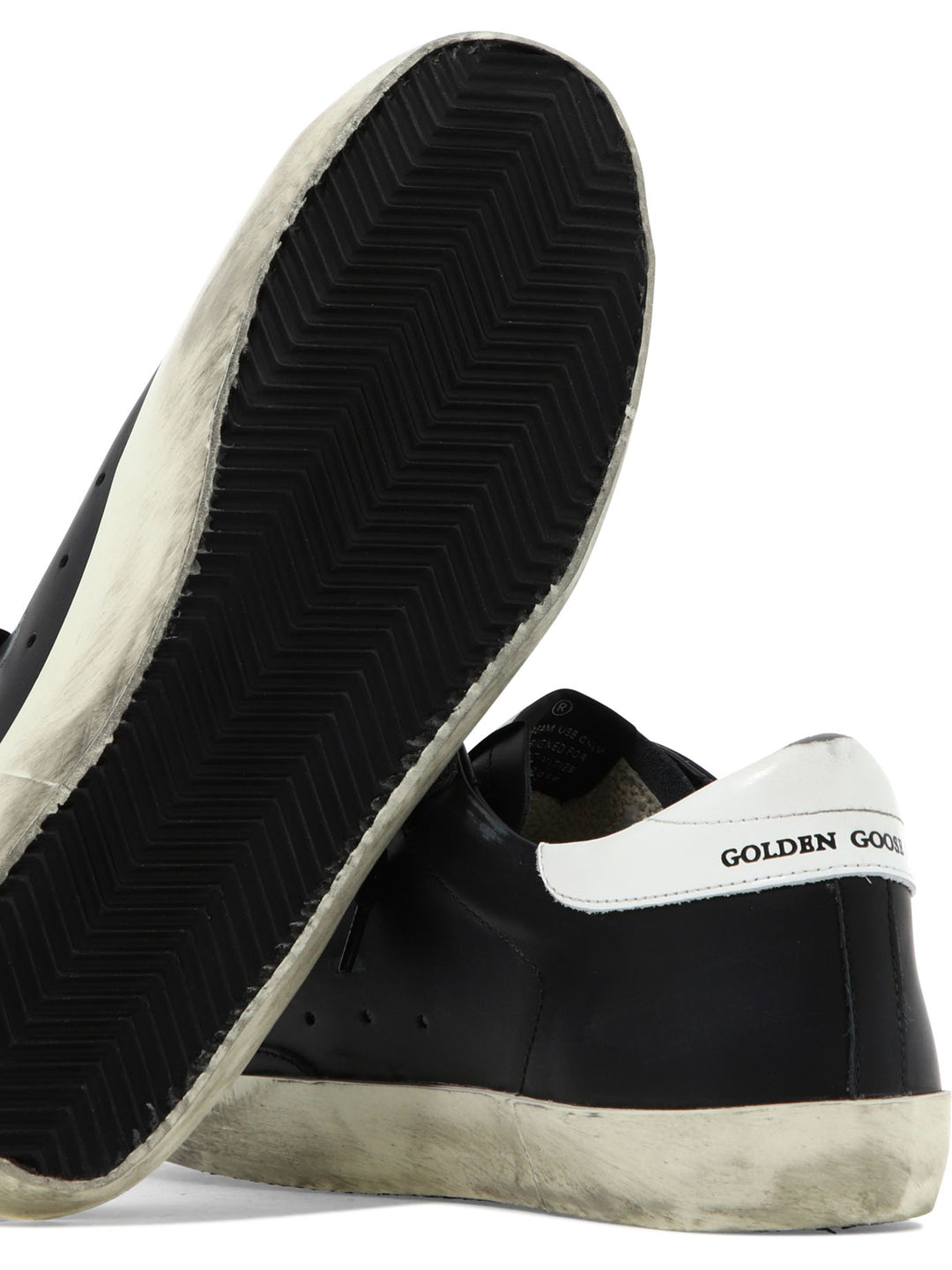 Golden Goose Super-Star Sneakers & Slip-On - Black | a16fa0c9177ae22d38677be63c1f0f63bb834106
