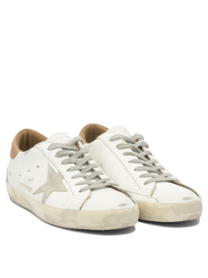 Golden Goose Super-Star Sneakers & Slip-On - White | d30649dccaa3033816456b84a7bce221e730d2bd