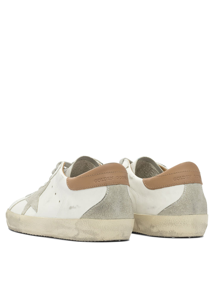 Golden Goose Super-Star Sneakers & Slip-On - White | ca2b24f0972a141a8358f926b1208dde38925a3f