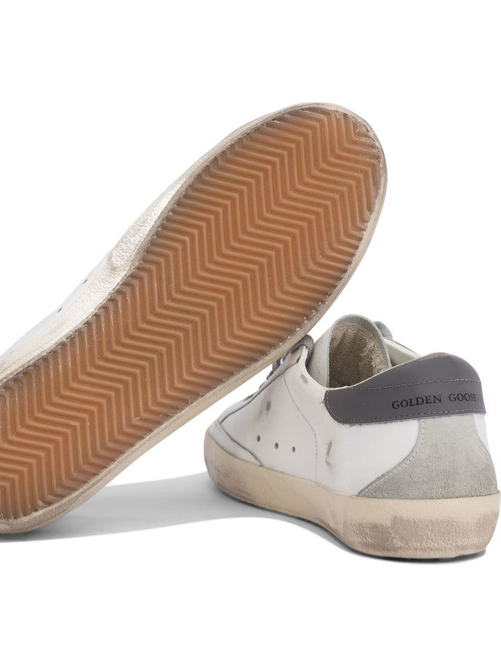 Golden Goose Super-Star Sneakers & Slip-On - White | eb3bf184c1c6d3a9e98c06ee50ee291e1ad8576d