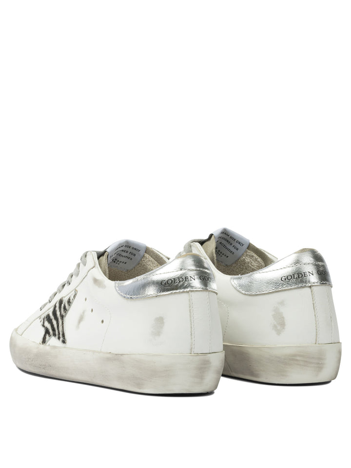 Golden Goose Super-Star Sneakers & Slip-On - White | 1e2a2c57df954e57886cdf04f792eb0b669f9e73