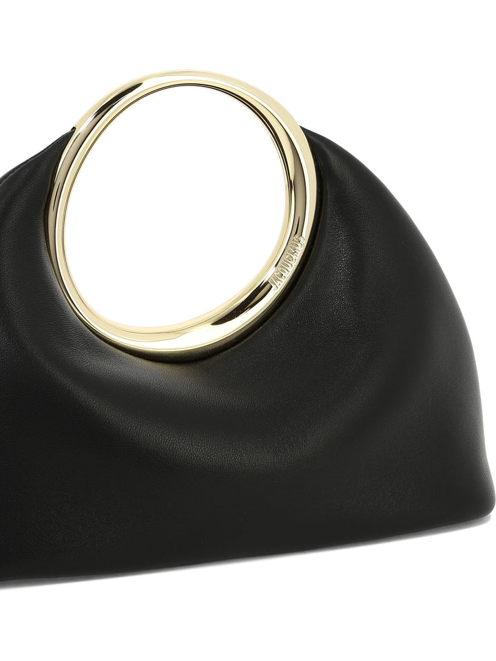 Jacquemus Calino Clutches - Black | e74e5b76bf272aac8c014cf0a1bb07defad29c49