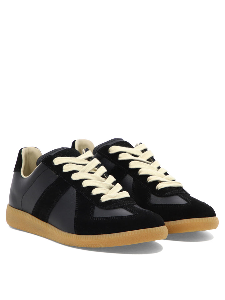 Maison Margiela Replica Sneakers & Slip-On - Black | e3226abcb609eba29449763566452644db98ea53