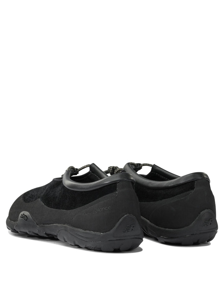 New Balance Tds Mt10t Sneakers & Slip-On - Black | f0b5fd246542f63c7c554428414037b4c1c65d0a