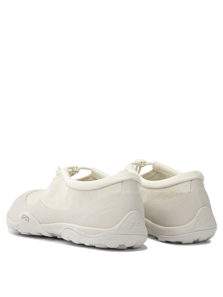 New Balance Tds Mt10t Sneakers & Slip-On - White | 8112e6534b8cb76e908b9c71b14b3cd33a2511c6