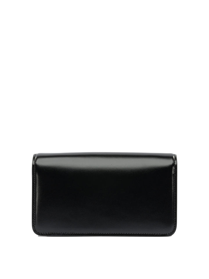 Valentino Garavani Vain Clutches - Black | 4ae8d2a5af7a239d0d3bb32af2d31152370ae301