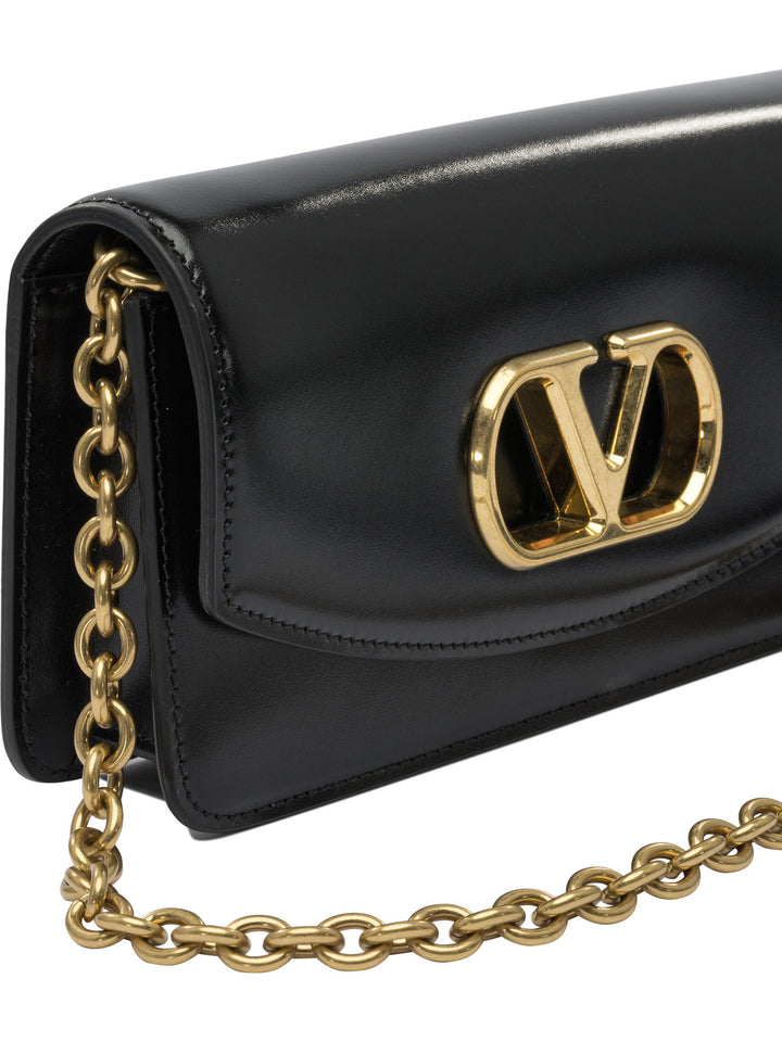 Valentino Garavani Vain Clutches - Black | 3e6df35e17538f789a2015e7162a2637a76955ef