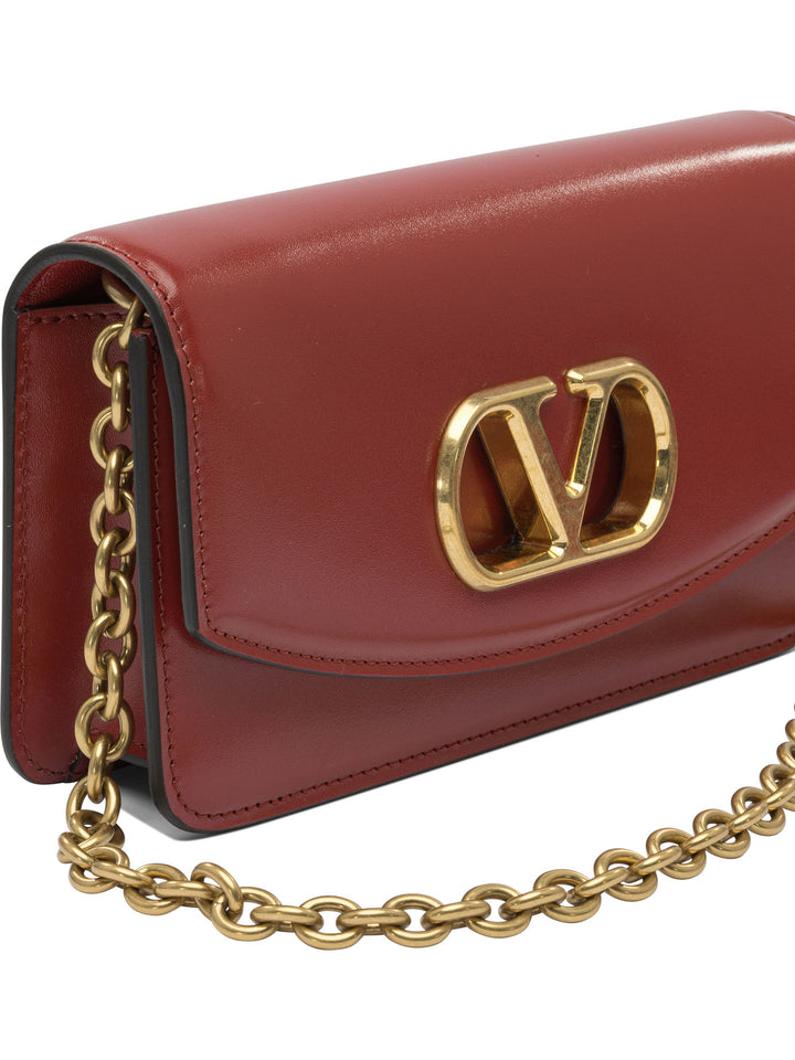 Valentino Garavani Vain Clutches - Red | 326d552231557d13aa986a37eb80fe30bb324831