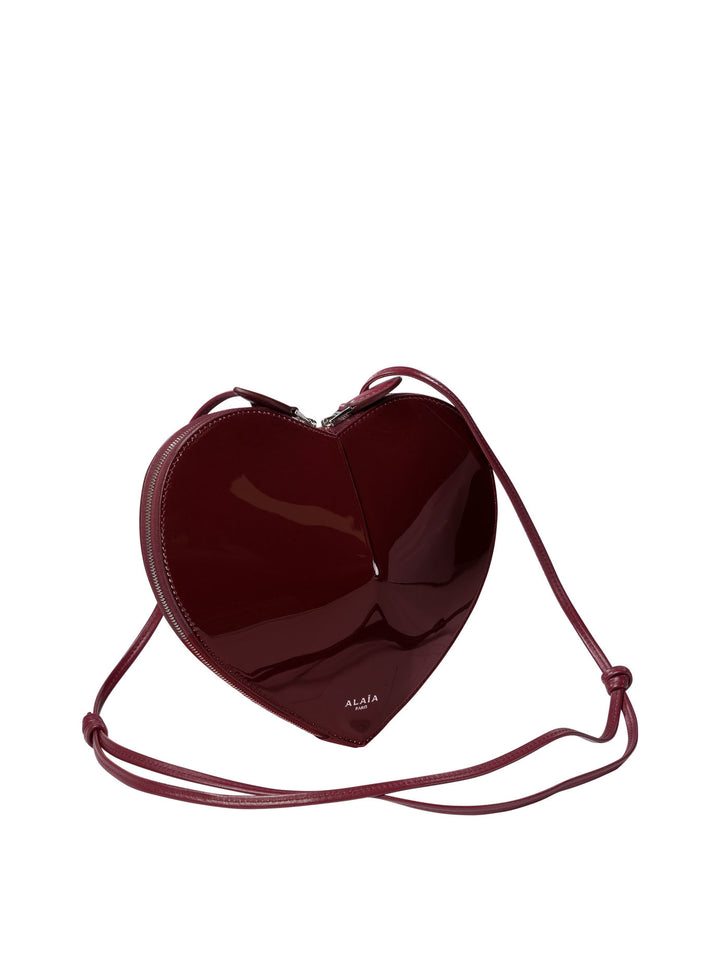 AlaïA Le Cœur Crossbody Bags - Bordeaux | f31454305d428df455b7ff89f16fc19319653de5