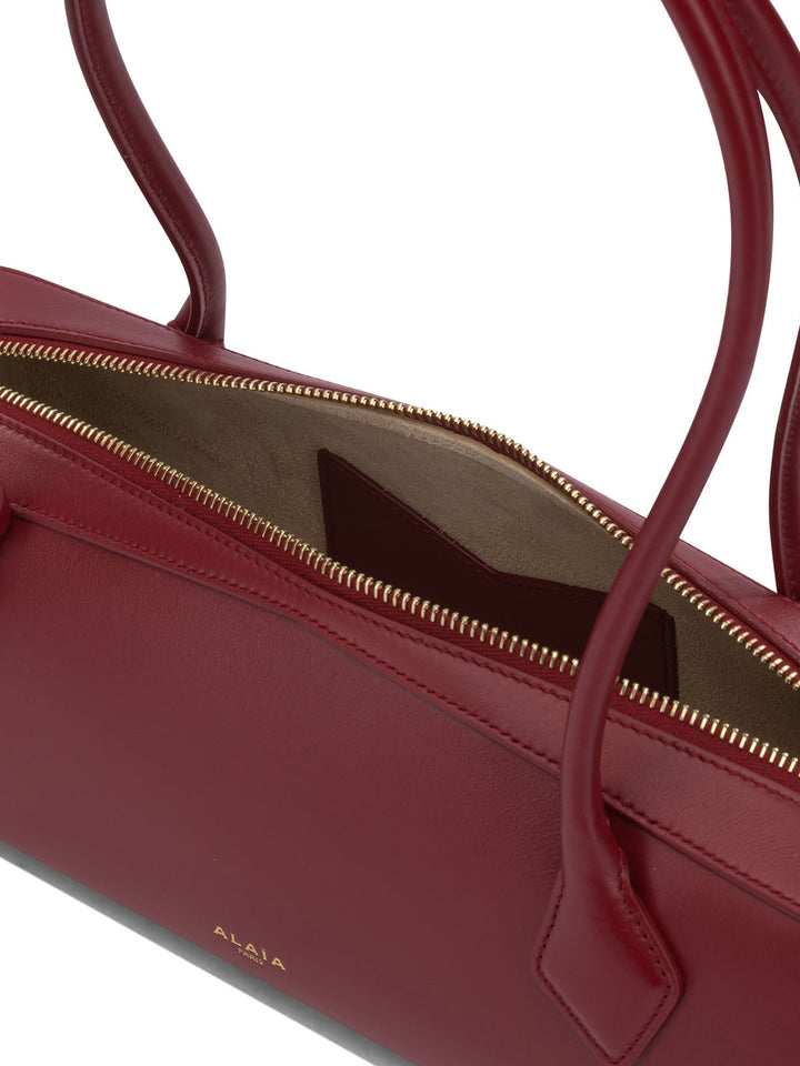 AlaïA Le Teckel Shoulder Bags - Red | 3e99c8dcc4115881aee16b52341283916938e788