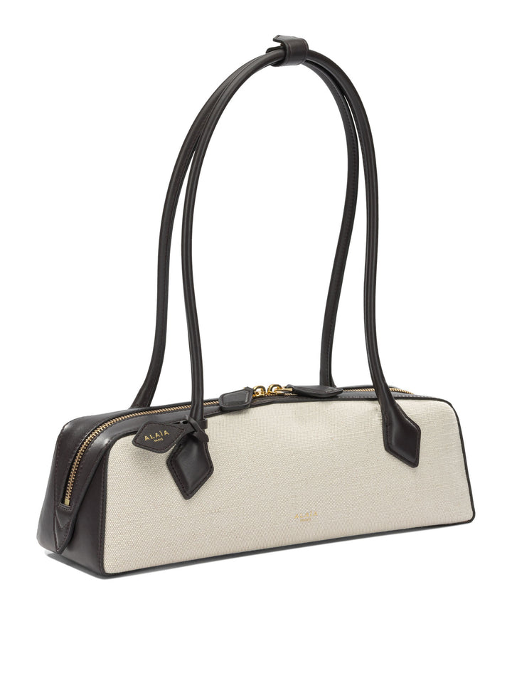 AlaïA Le Teckel Shoulder Bags - Beige | 76921a3fbe6751eaf2d852cf197ff1175bd048c8