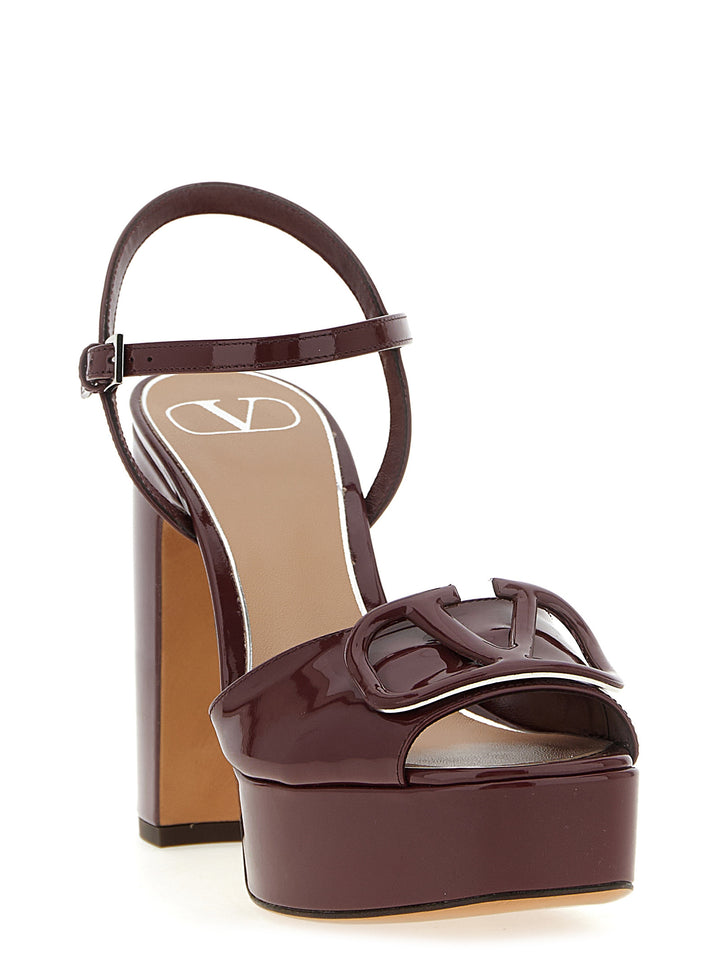 Valentino Garavani Valentino Garavani Vlogo Signature Sandals - Bordeaux | 27c80826de2520a7612456b9c0e14b985a82bb36