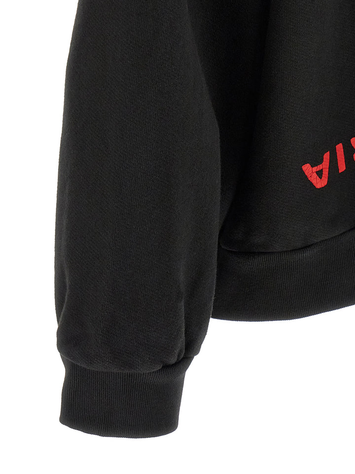 Willy Chavarria Welcome To America-Hooligan Sweatshirt - Black | 7954d46b43bfa35a921d432b029cd41a214fa7fc