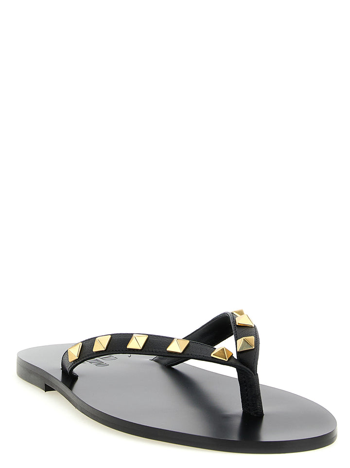 Valentino Garavani Thong Rockstud Sandals - Black | cfbb4966e75a838fbf651fe70145904612c6db74