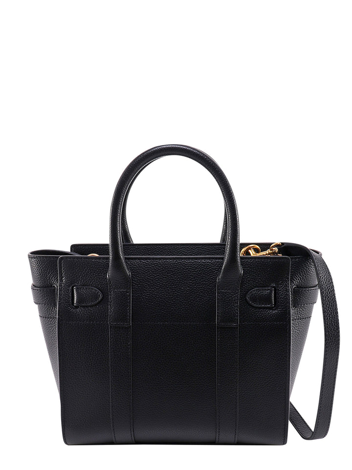 Leather handbag with frontal walker