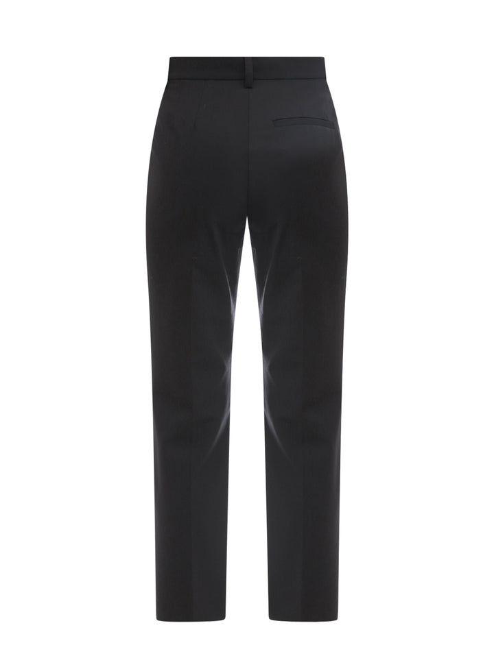 Wool trouser with iconic metal patch