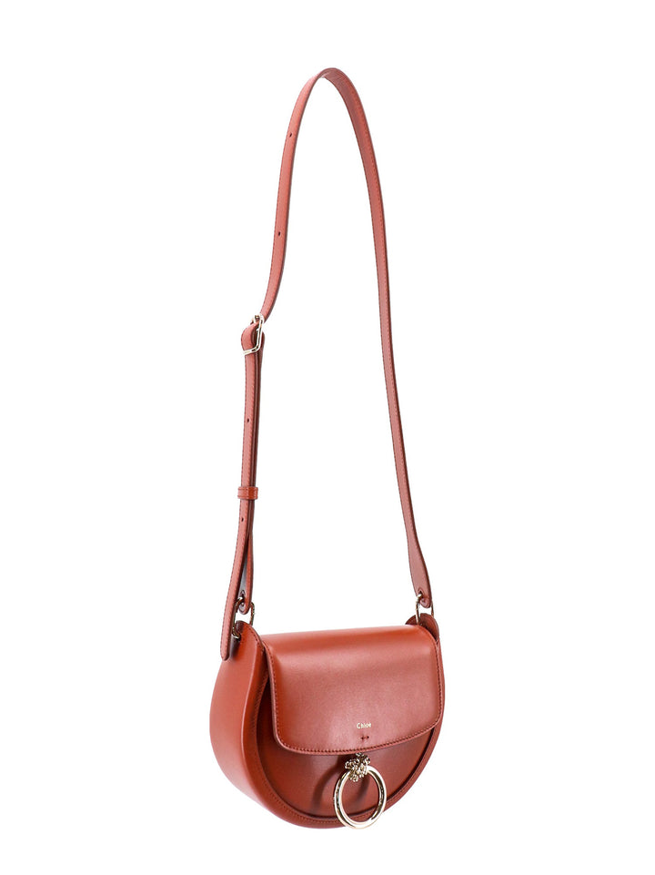 Leather shoulder bag with metal ring